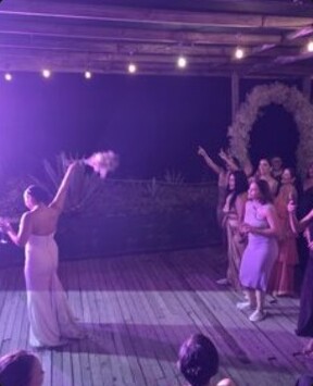 A guest dancing at the wedding reception